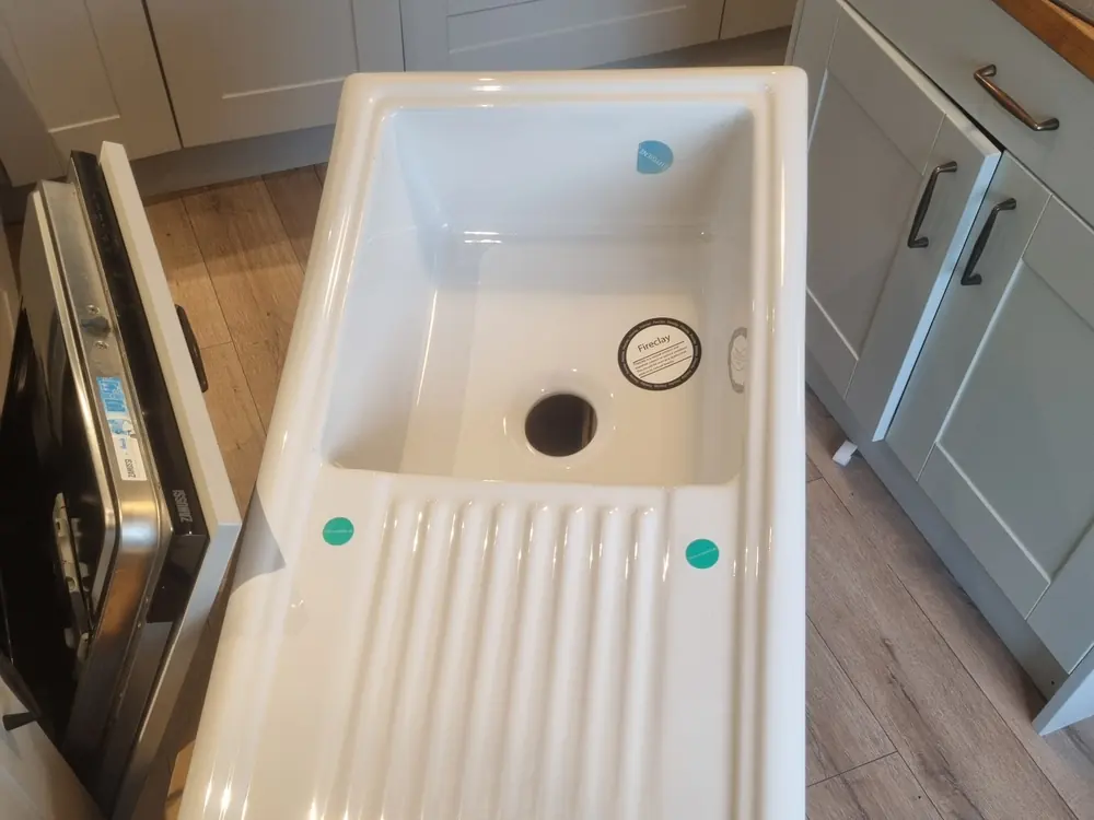 New kitchen sink being fitted on a job in South Wales