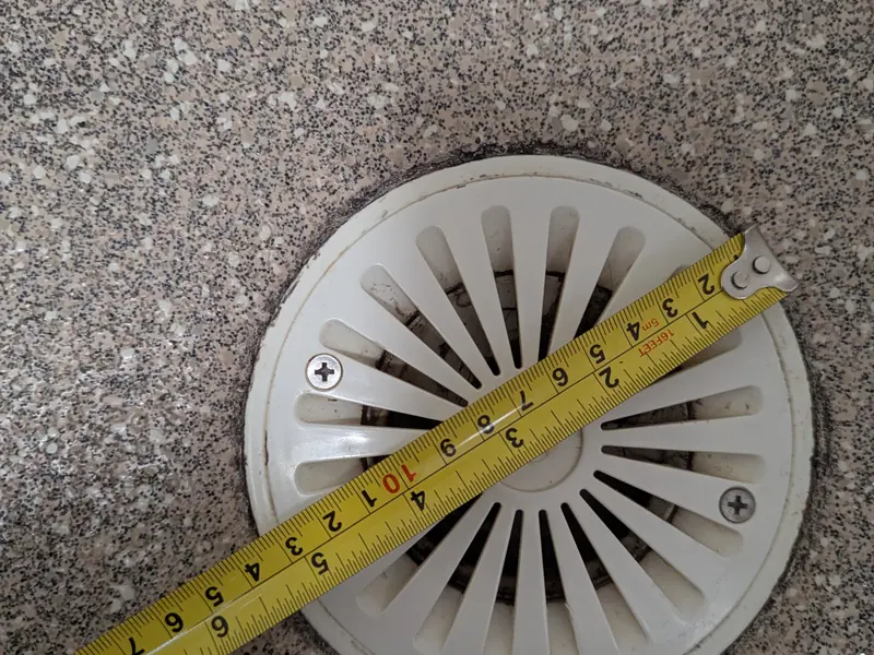 Outside drain being measured up before clearing